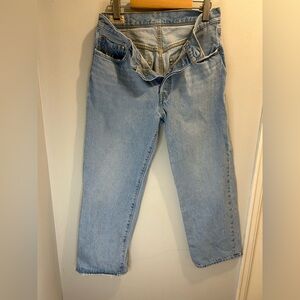 Classic Levi's 501s with that perfect 90s vintage vibe and a cool raw hem.